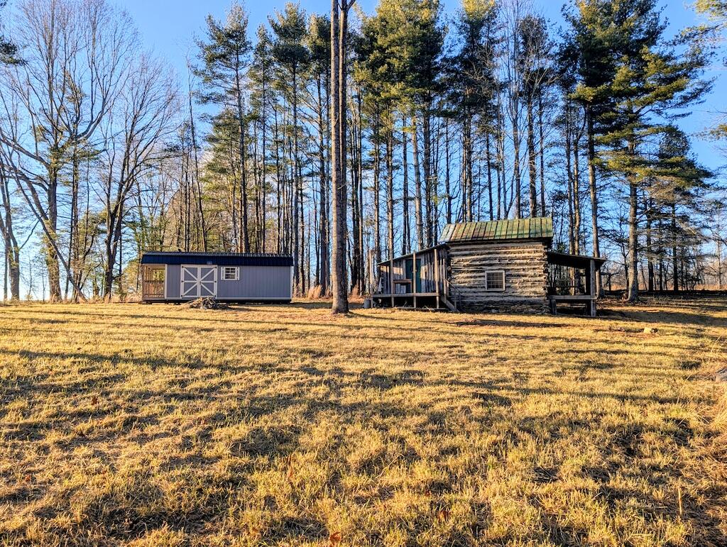 Tbd Long Mountain Road Southwest Willis, VA 24380 - Photo 10 of 16 a swimming pool with outdoor seating and yard