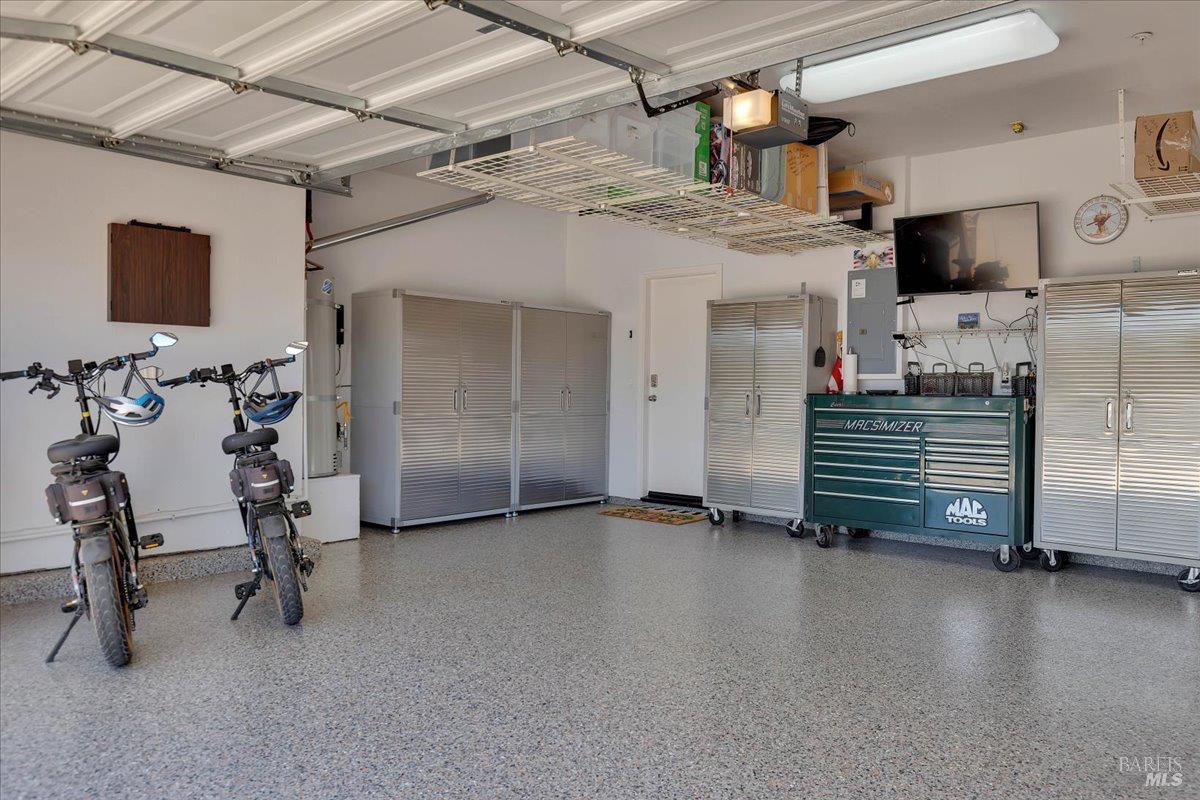 331 Frisbie Circle Vacaville, CA 95688 - Photo 77 of 93 Immaculate garage with epoxy floor and all storage cabinets to stay!