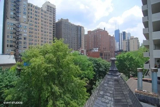 a view of a city with tall buildings