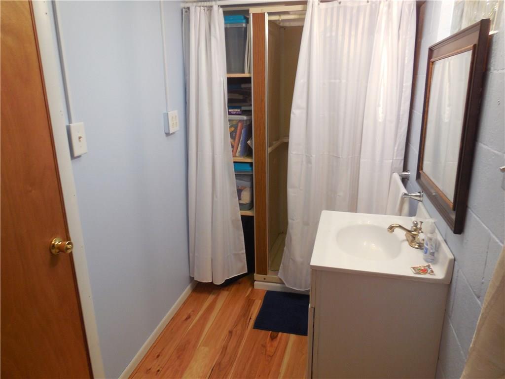 551 Allendale Road Rochester, PA 15074 - Photo 13 of 22 LOWER LEVEL FULL BATH HAS HICKORY HARDWOOD FLOOR.