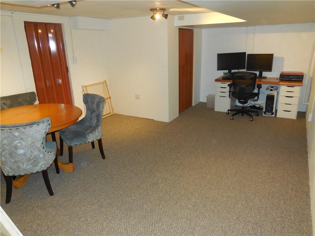 551 Allendale Road Rochester, PA 15074 - Photo 20 of 22 Game room has brand new carpet and leads to laundry room and storage.