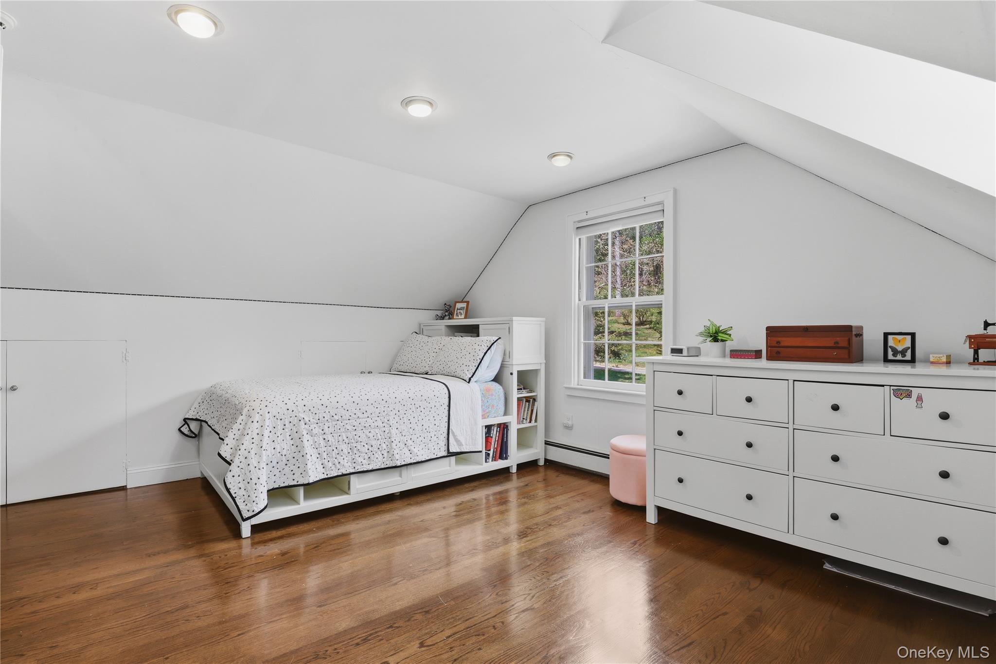 576 Old Post Road Bedford, NY 10506 - Photo 23 of 29 a bedroom with a bed and a dresser