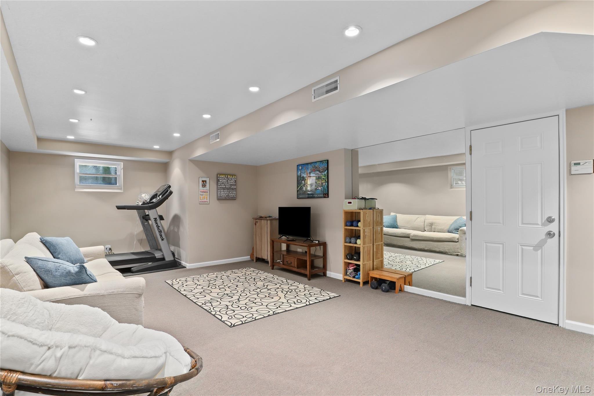 576 Old Post Road Bedford, NY 10506 - Photo 25 of 29 a room with furniture and a flat screen tv