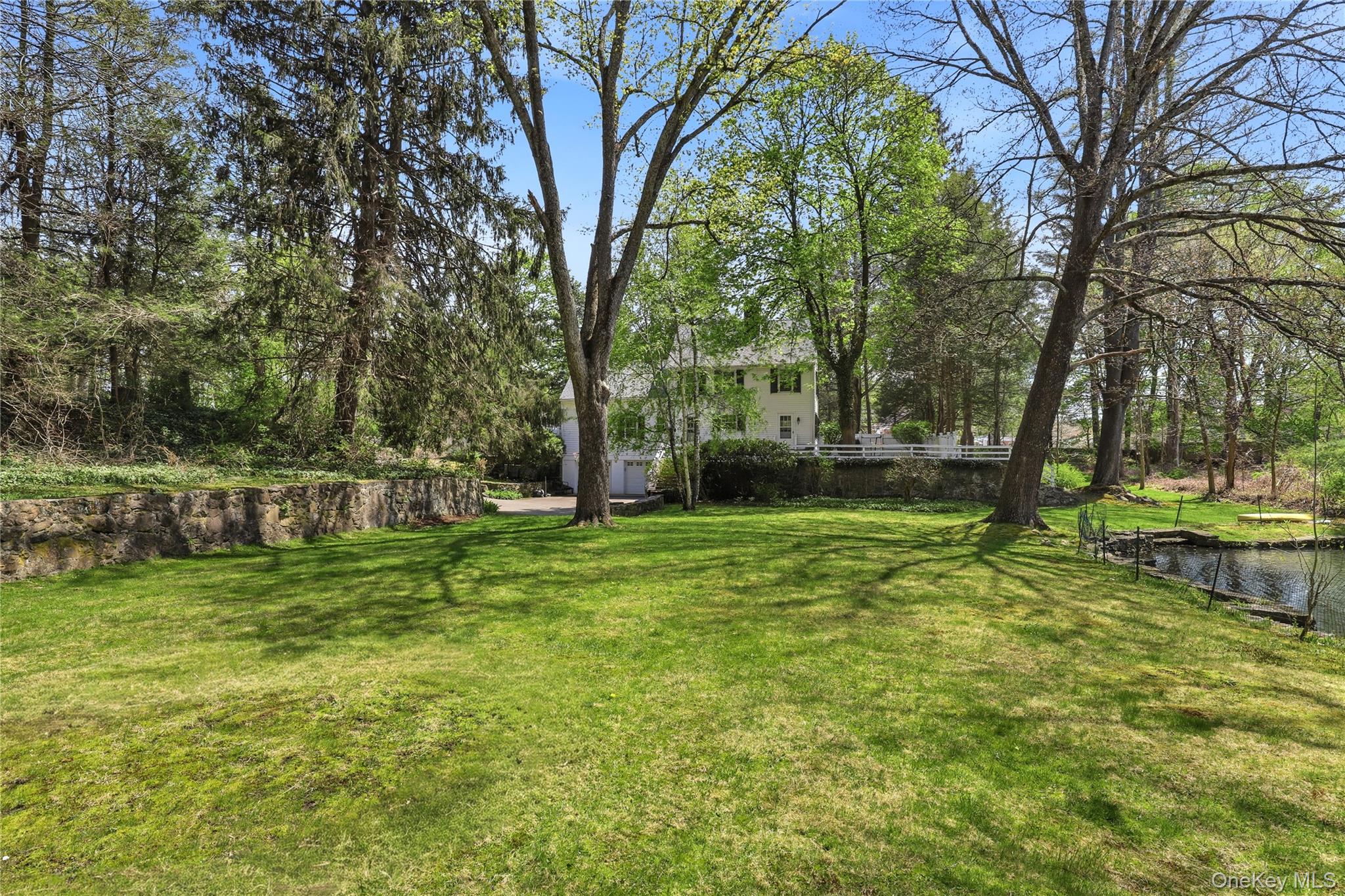 576 Old Post Road Bedford, NY 10506 - Photo 6 of 29 a view of a park with large trees