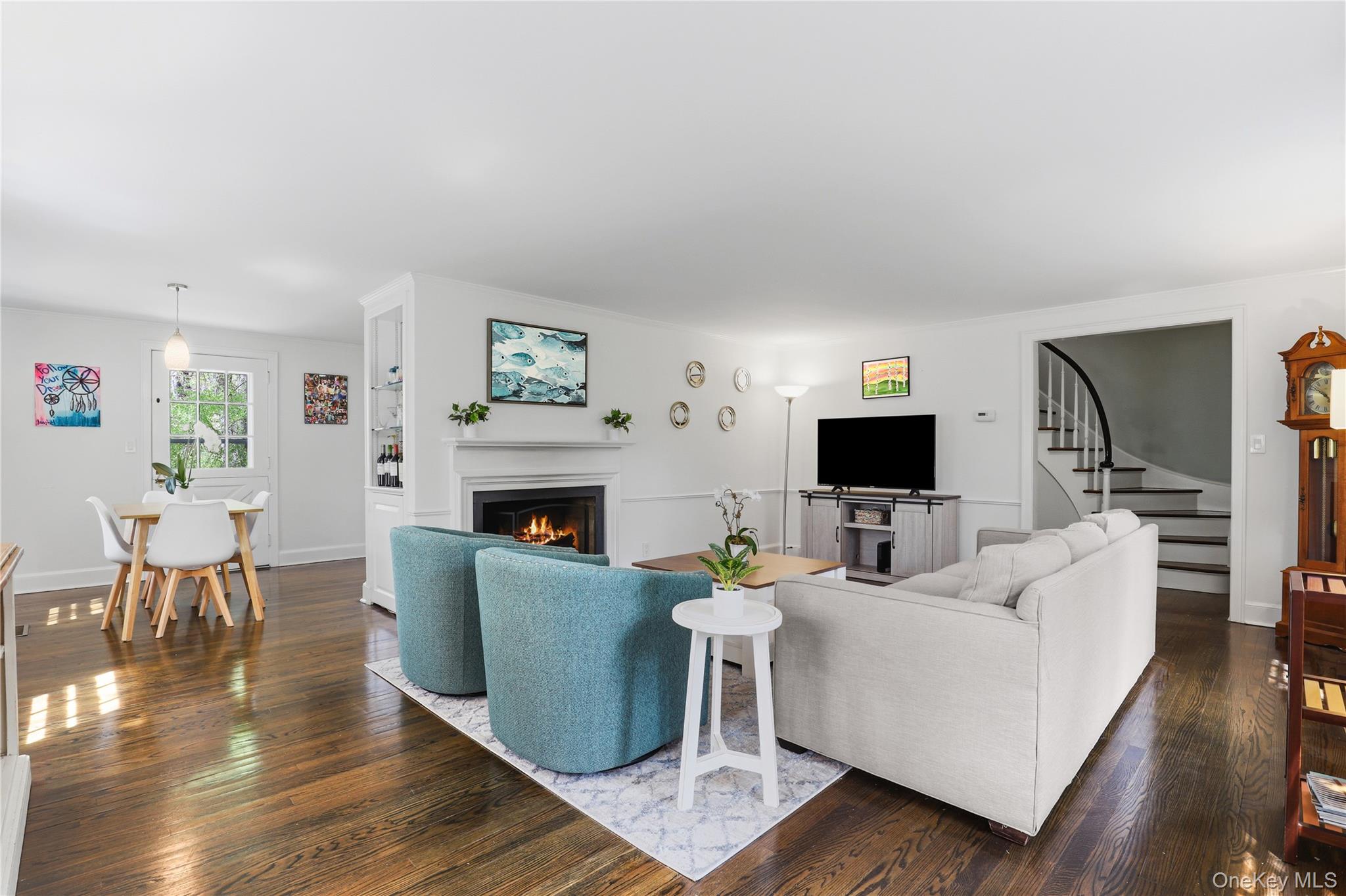 576 Old Post Road Bedford, NY 10506 - Photo 8 of 29 a living room with furniture a flat screen tv and a fireplace