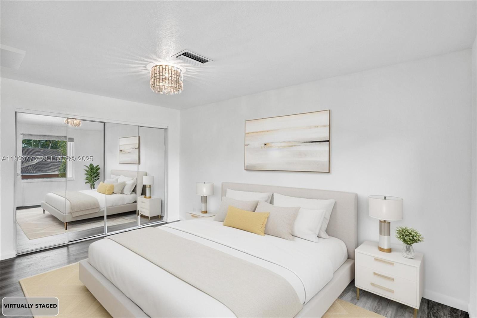 740 Cypress Pointe Drive East Pembroke Pines, FL 33027 - Photo 31 of 46 a bedroom with bed and wooden floor