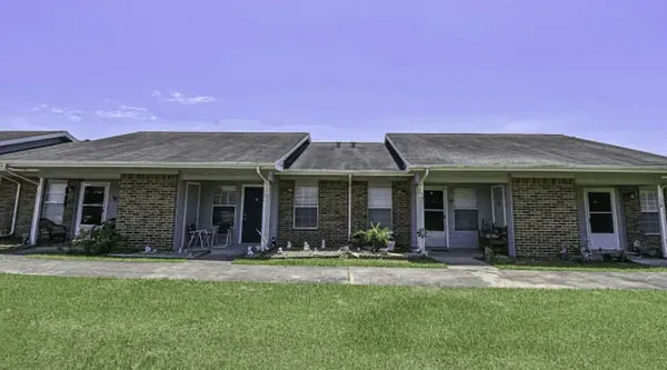 a front view of a house with a porch