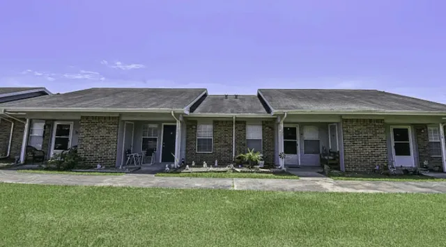 a front view of a house with a porch