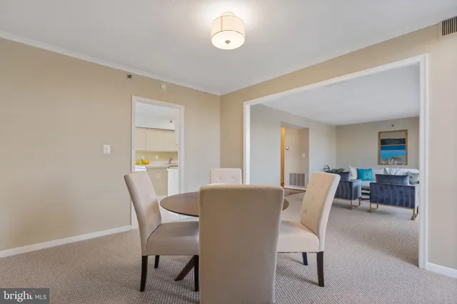 a view of a dining room with furniture