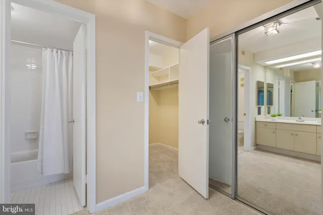 a bathroom with a double vanity sink mirror and double