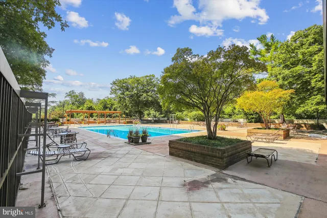 a view of a backyard with a lake view