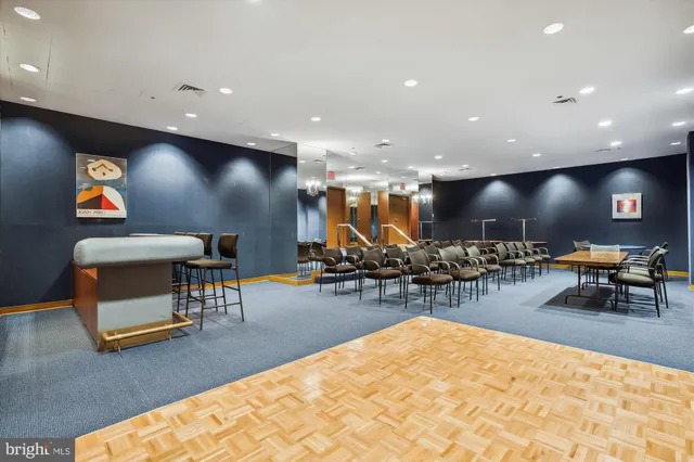 a group of chairs sitting in kitchen and dining room