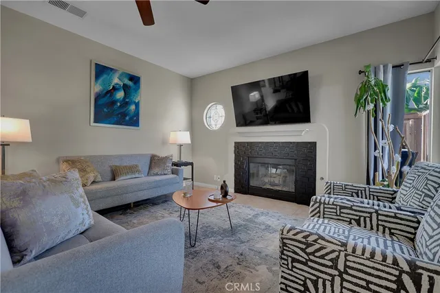 a bathroom with a granite countertop shower and a sink