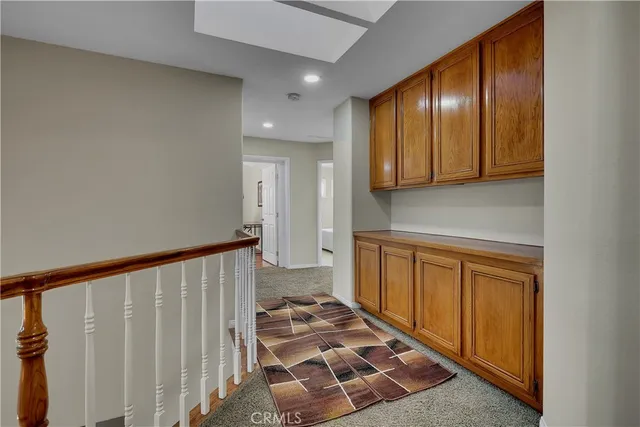 a spacious bathroom with a sink a large mirror and a bathtub