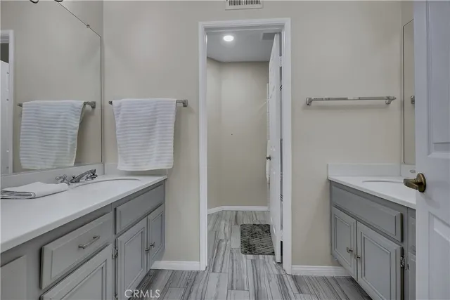 a view of a backyard with sitting area and garden