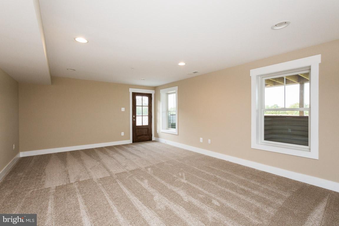 3838 Bullfrog Road Taneytown, MD 21787 - Photo 24 of 28 Finished walk-out basement.