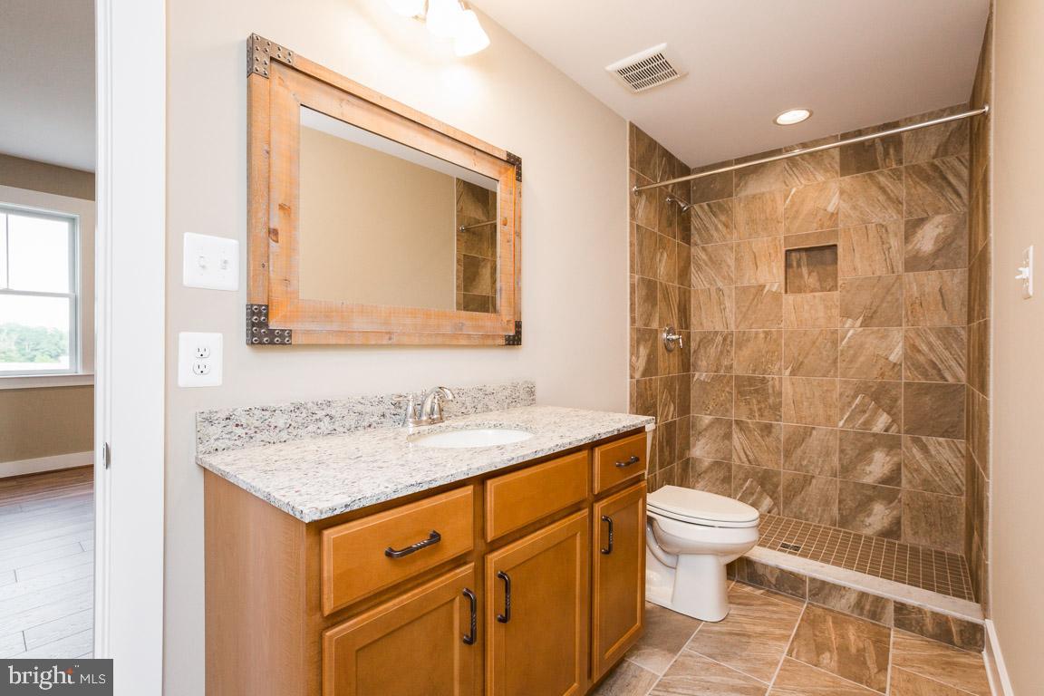 3838 Bullfrog Road Taneytown, MD 21787 - Photo 5 of 28 Main floor full bath.