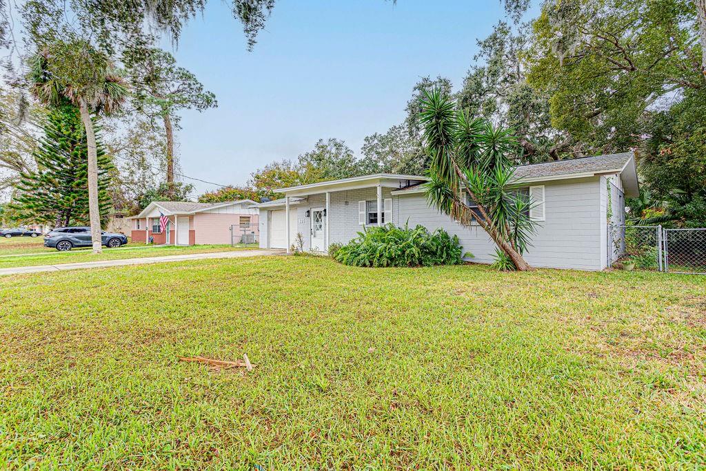 835 5th Street Port Orange, FL 32129 - Photo 11 of 17 a house view with a garden space