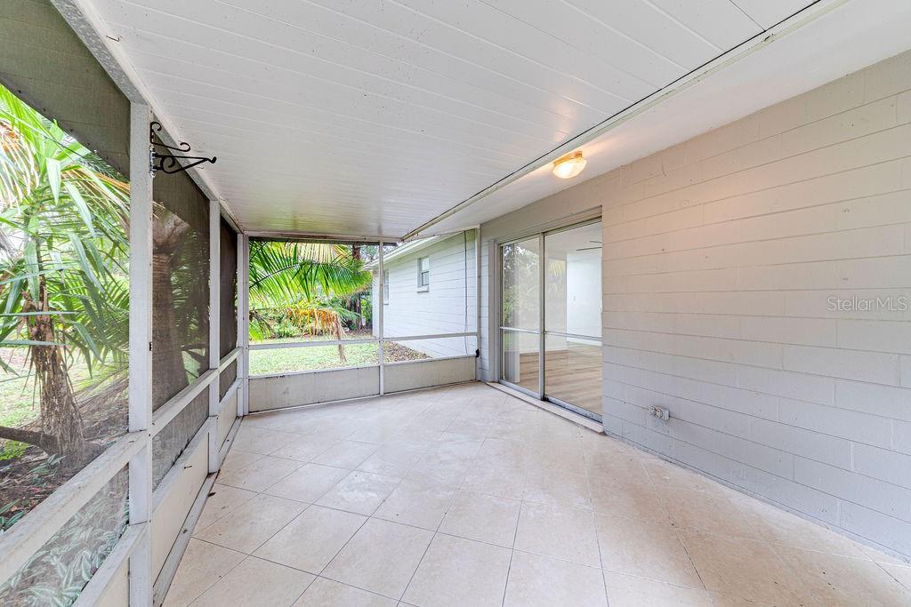 835 5th Street Port Orange, FL 32129 - Photo 17 of 17 a view of an empty room with a window