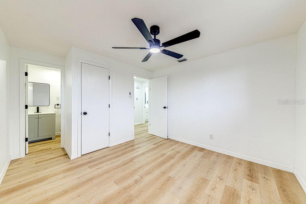 835 5th Street Port Orange, FL 32129 - Photo 8 of 17 a view of empty room with wooden floor