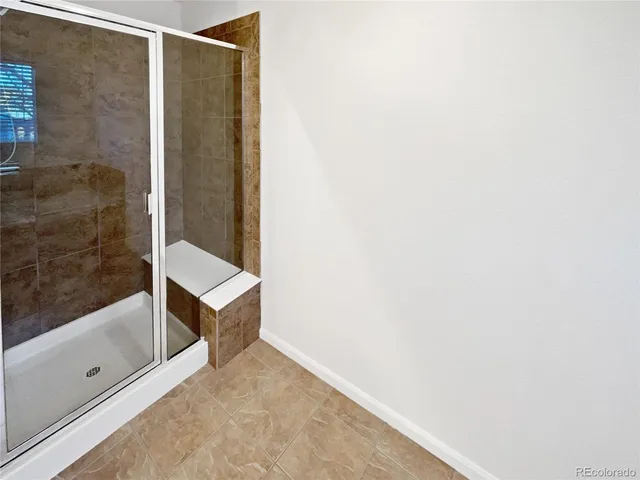 a view of empty room with windows