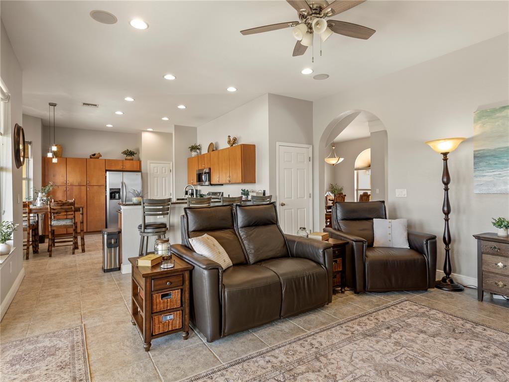 20 Fort Clinch Heights Road Frostproof, FL 33843 - Photo 12 of 38 a living room with furniture and kitchen view