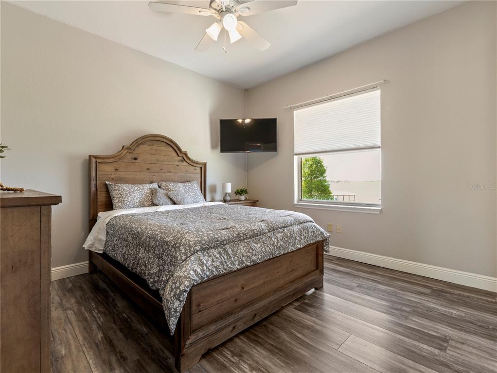 20 Fort Clinch Heights Road Frostproof, FL 33843 - Photo 22 of 38 a bedroom with a bed and a window