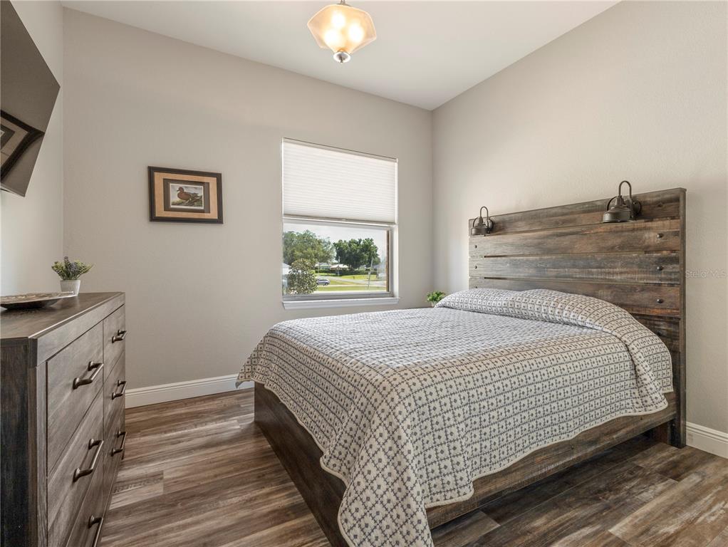 20 Fort Clinch Heights Road Frostproof, FL 33843 - Photo 23 of 38 a bedroom with a bed and a window