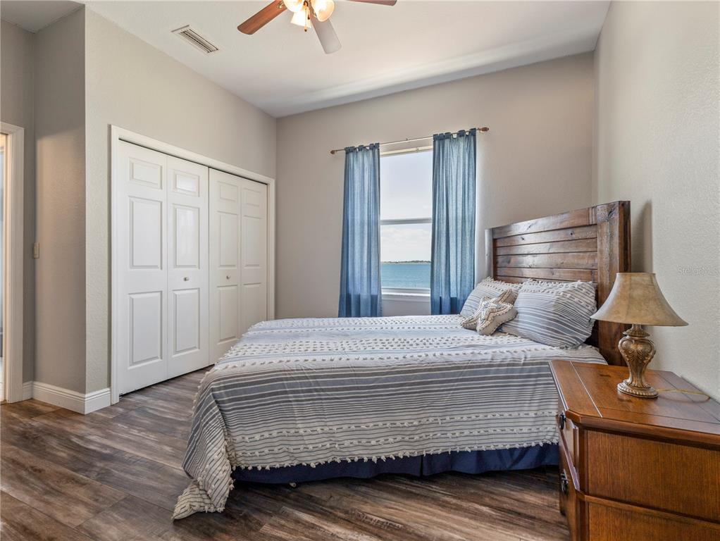 20 Fort Clinch Heights Road Frostproof, FL 33843 - Photo 24 of 38 a bedroom with a bed and window
