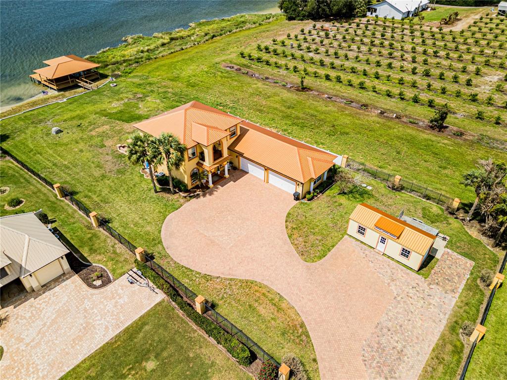 20 Fort Clinch Heights Road Frostproof, FL 33843 - Photo 3 of 38 an aerial view of a swimming pool