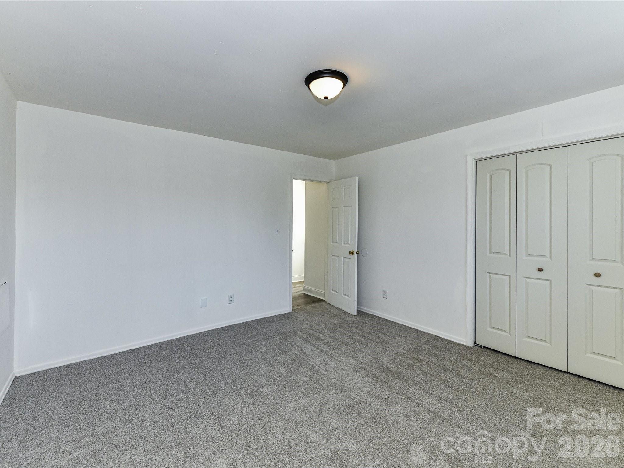 8322 Knights Bridge Road Charlotte, NC 28210 - Photo 25 of 37 a view of an empty room