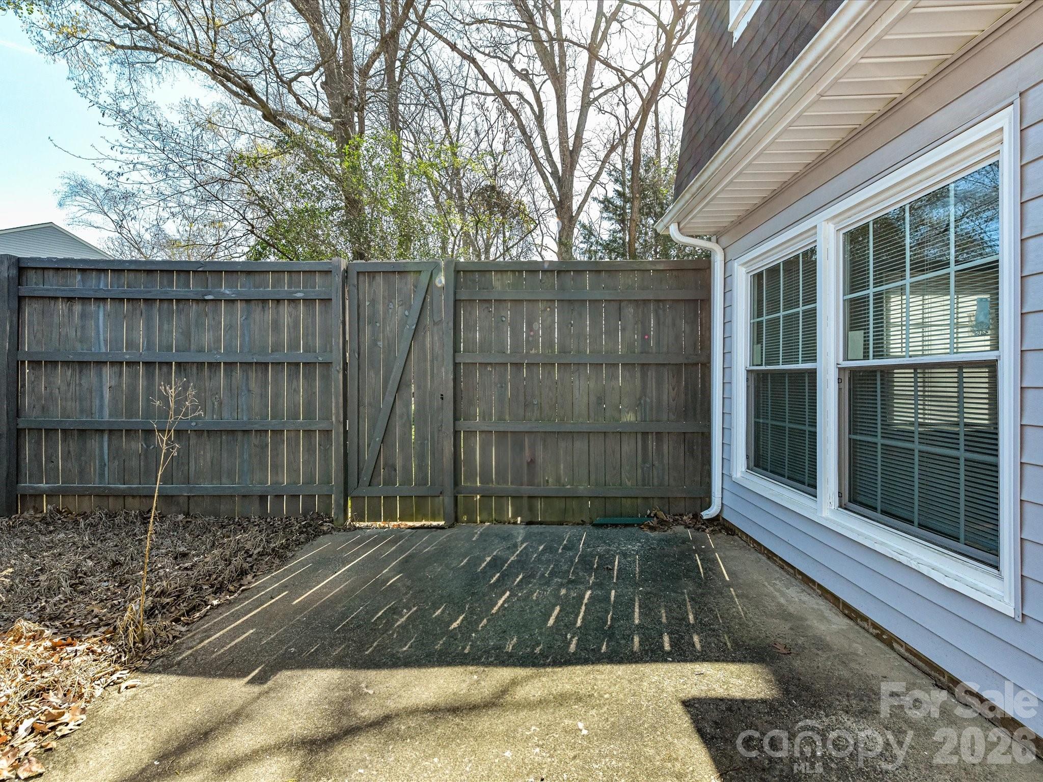8322 Knights Bridge Road Charlotte, NC 28210 - Photo 35 of 37 a view of a house with a large window