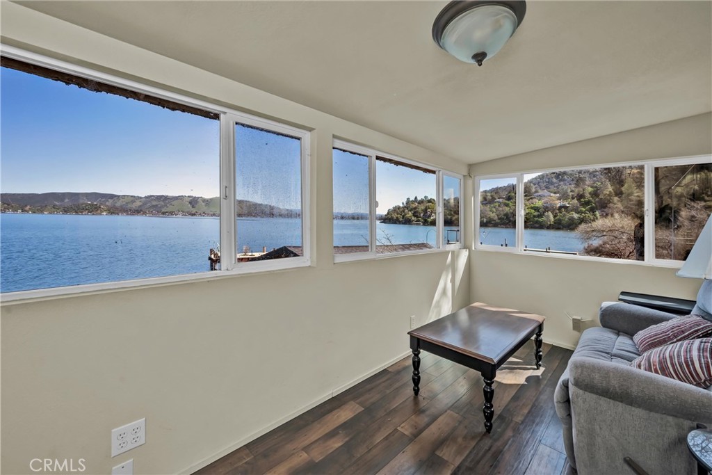 12800 Anderson Road Lower Lake, CA 95457 - Photo 15 of 20 a living room with furniture and a floor to ceiling window