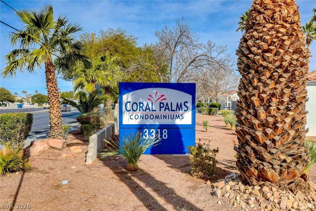 3318 North Decatur Boulevard, Unit 2072 Las Vegas, NV 89130 - Photo 47 of 50 The welcoming entrance to Coral Palms Condominiums with mature palm trees and desert landscaping.