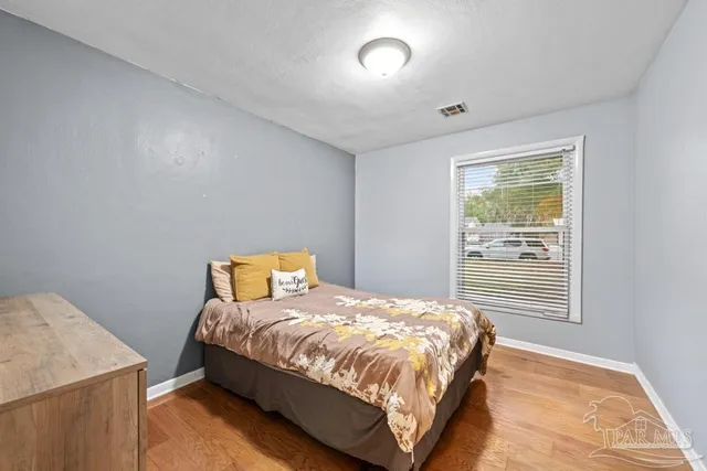 a balcony with furniture and garden view
