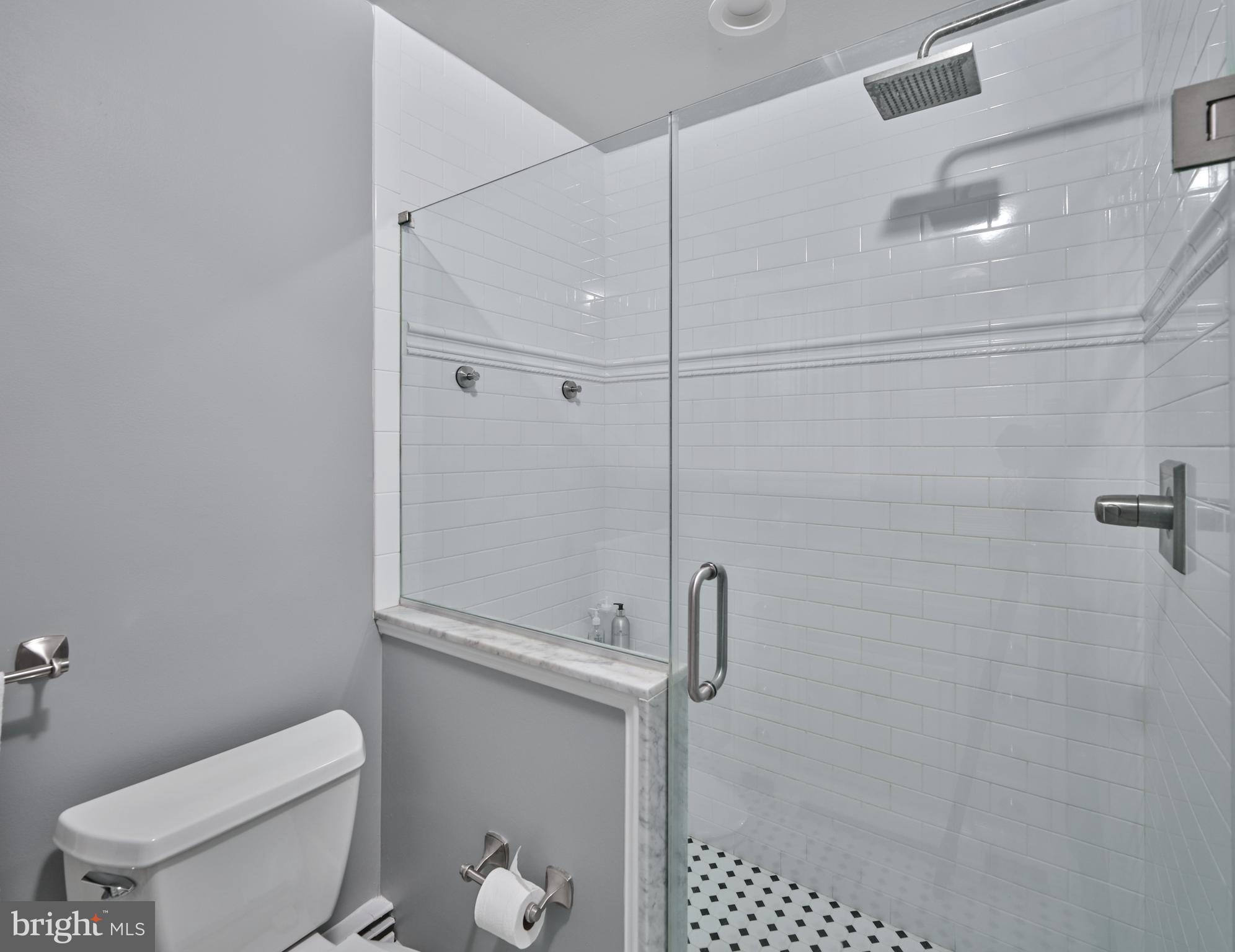2976 River Road New Hope, PA 18938 - Photo 17 of 37 a white toilet sitting next to a bathroom sink