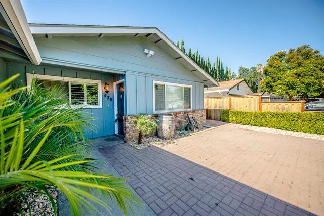a house with yard in front of it