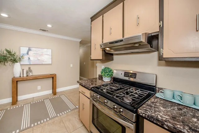 a bathroom with a toilet a sink and bathtub