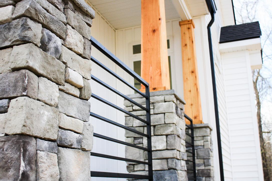 82 South Ridge Clarksville, TN 37043 - Photo 4 of 23 This stone, with the black railing, and craftsman post, What a Combination!
