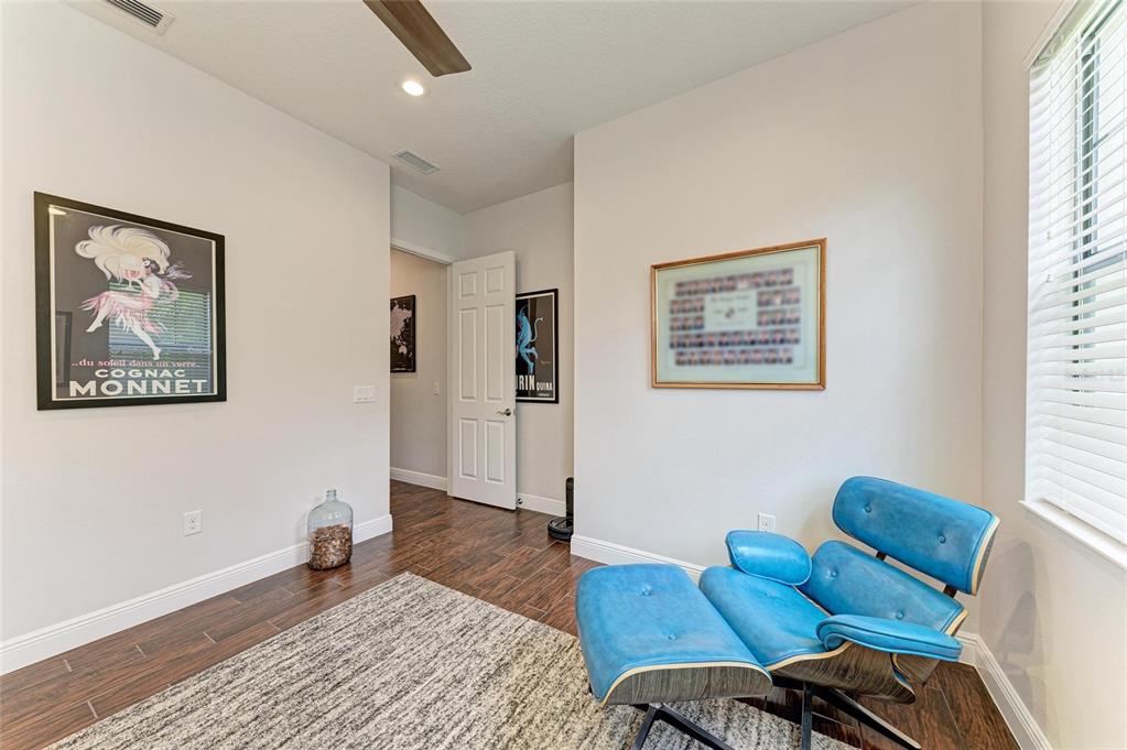 544 Fore Drive Bradenton, FL 34208 - Photo 32 of 95 a living room with furniture and wooden floor