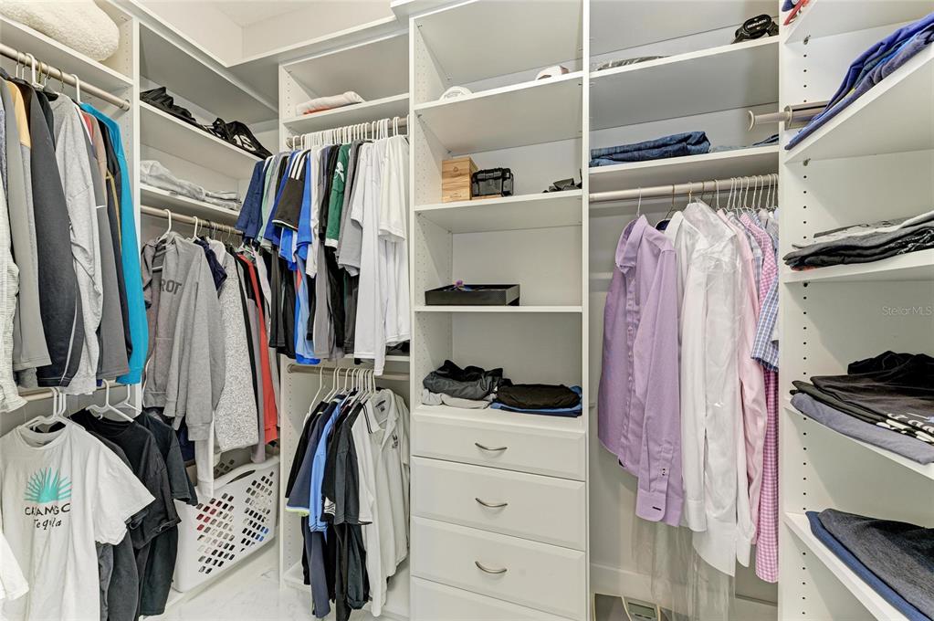 544 Fore Drive Bradenton, FL 34208 - Photo 37 of 95 a view of walk in closet with clothes and shoes