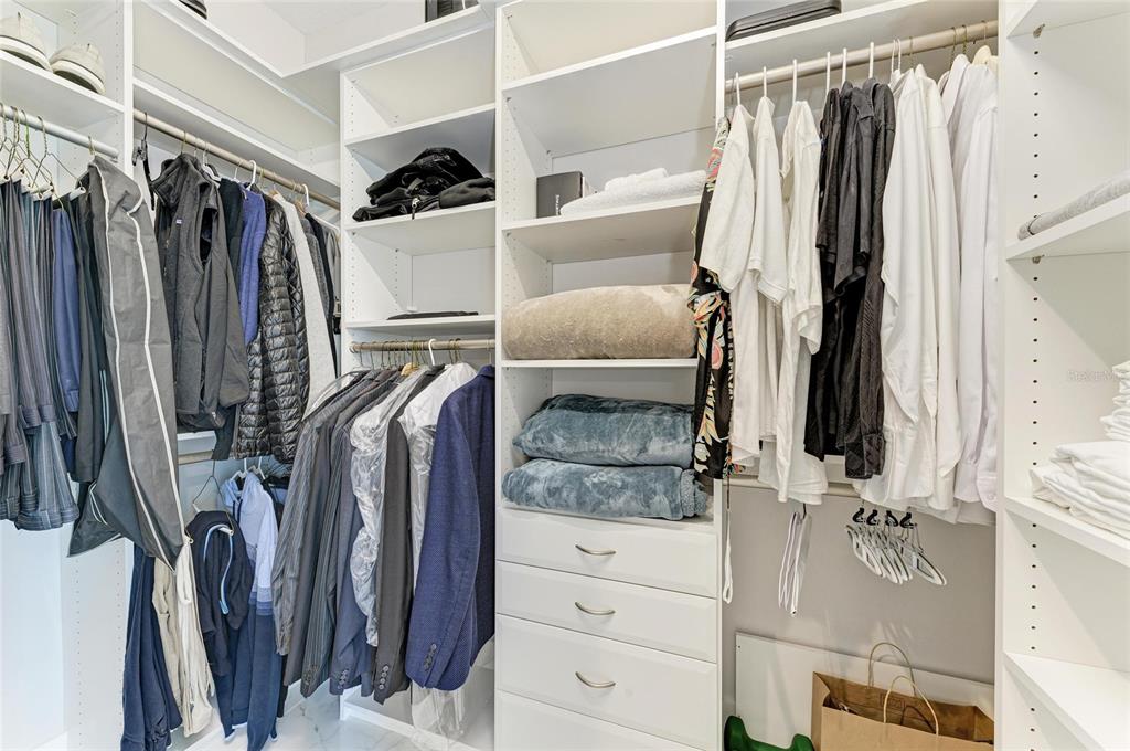 544 Fore Drive Bradenton, FL 34208 - Photo 38 of 95 a view of walk in closet with clothes and shoes