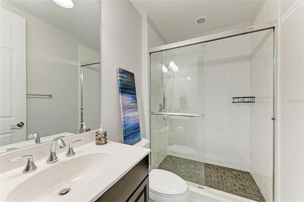 544 Fore Drive Bradenton, FL 34208 - Photo 52 of 95 a bathroom with a sink a toilet and shower