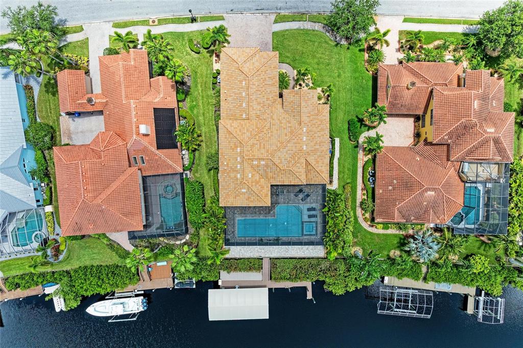 544 Fore Drive Bradenton, FL 34208 - Photo 79 of 95 an aerial view of a house with a garden and swimming pool