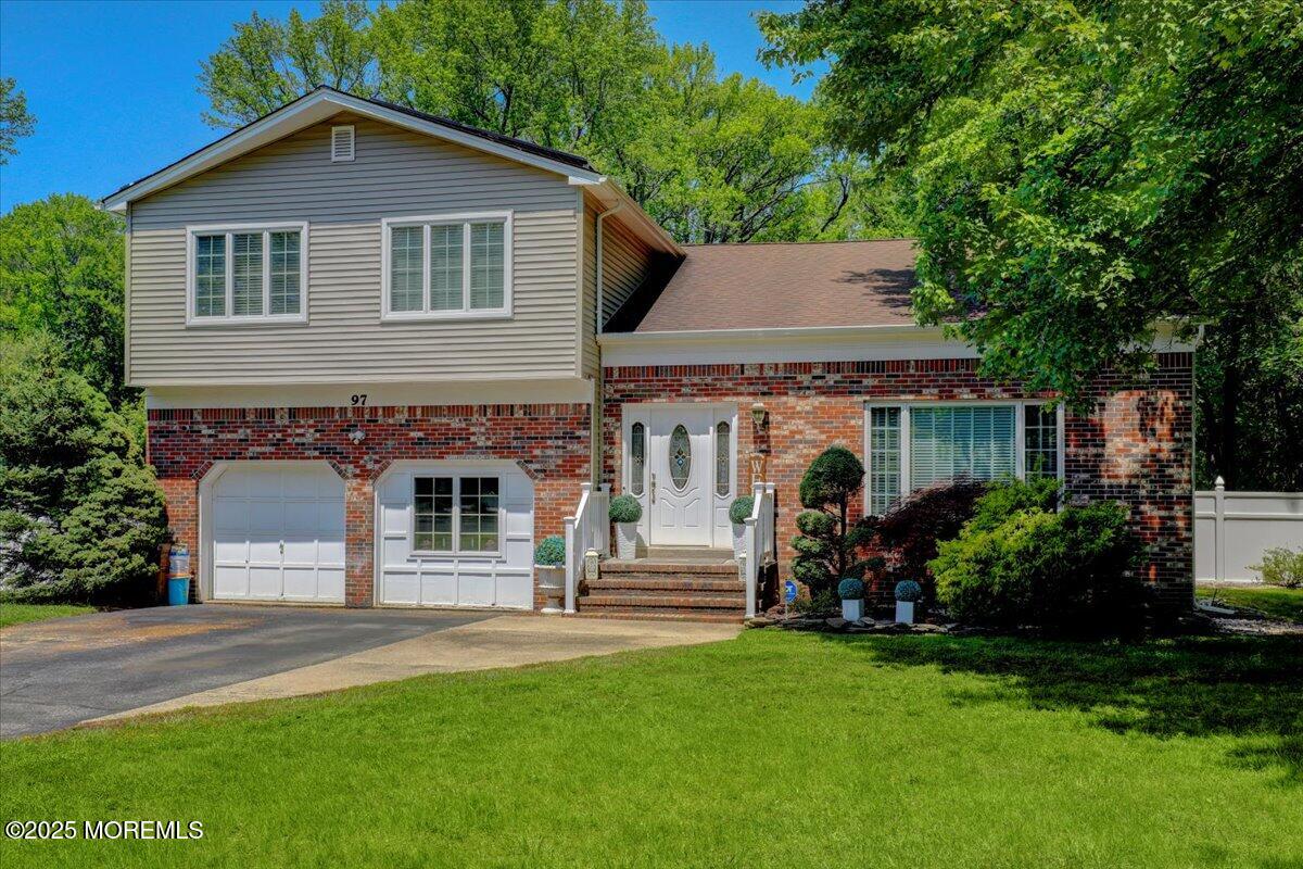 front view of a house with a yard