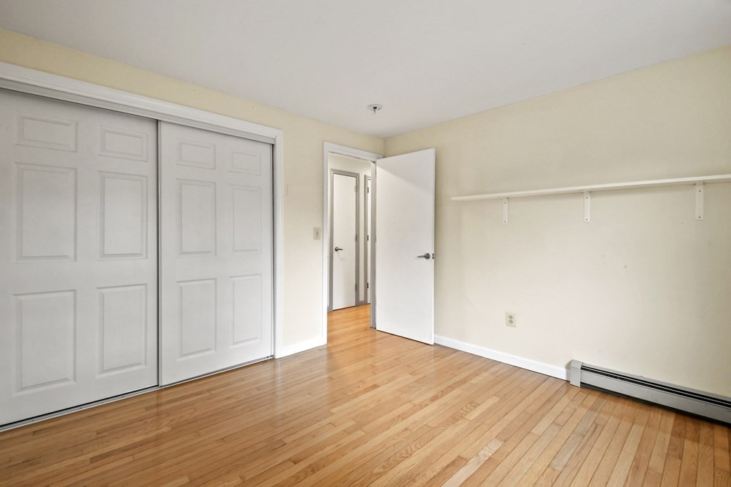50 Perry Road Rindge, NH 03461 - Photo 23 of 36 a view of an empty room with wooden floor