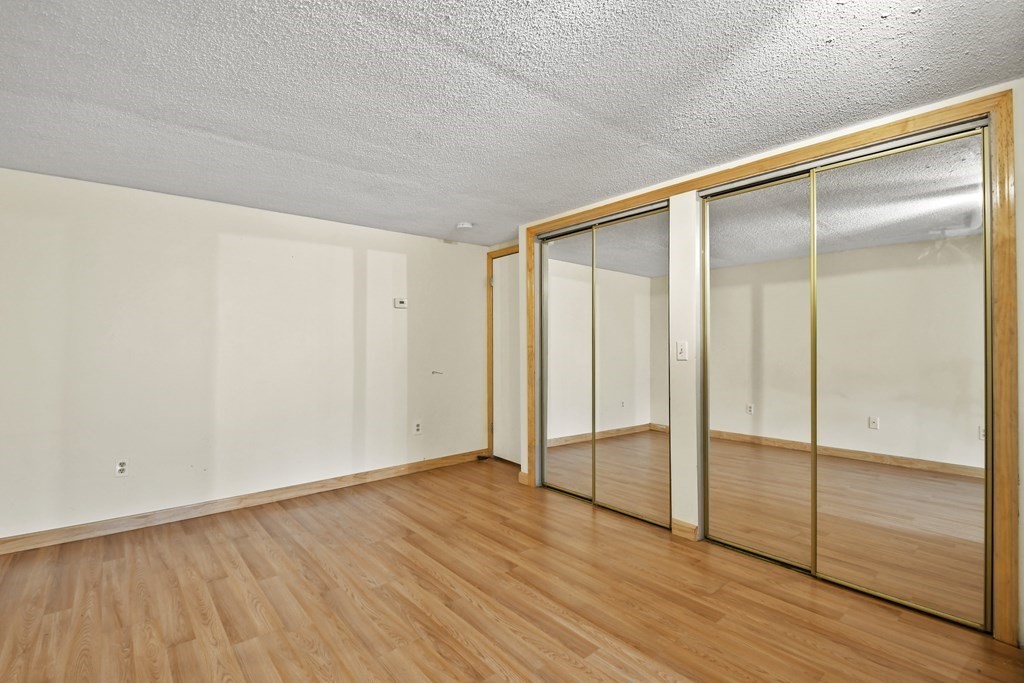 50 Perry Road Rindge, NH 03461 - Photo 28 of 36 a view of an empty room with wooden floor