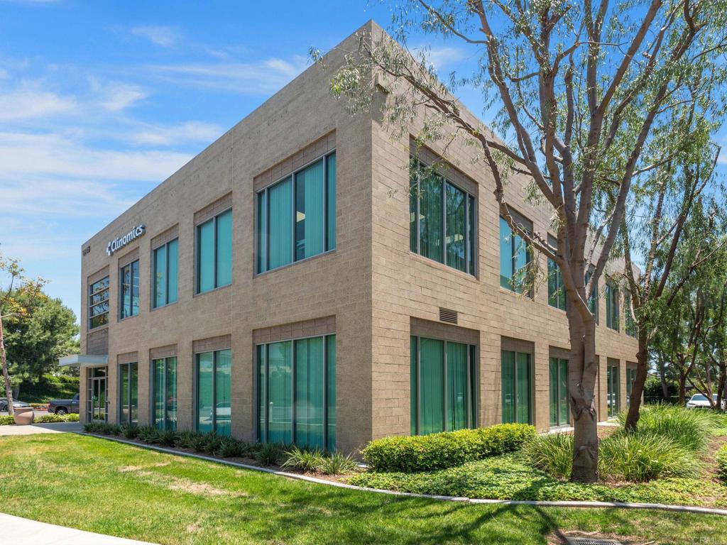 8945 Research Drive Irvine, CA 92618 - Photo 2 of 59 front view of a brick house with a yard