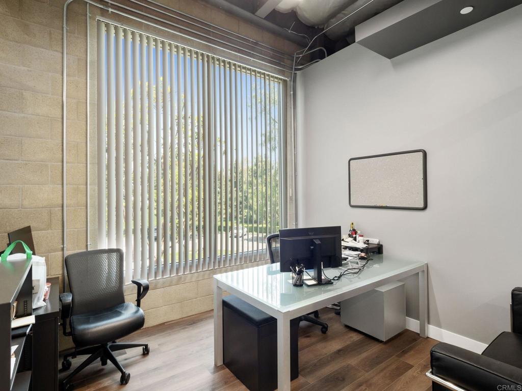 8945 Research Drive Irvine, CA 92618 - Photo 23 of 59 a view of workspace with furniture and wooden floor