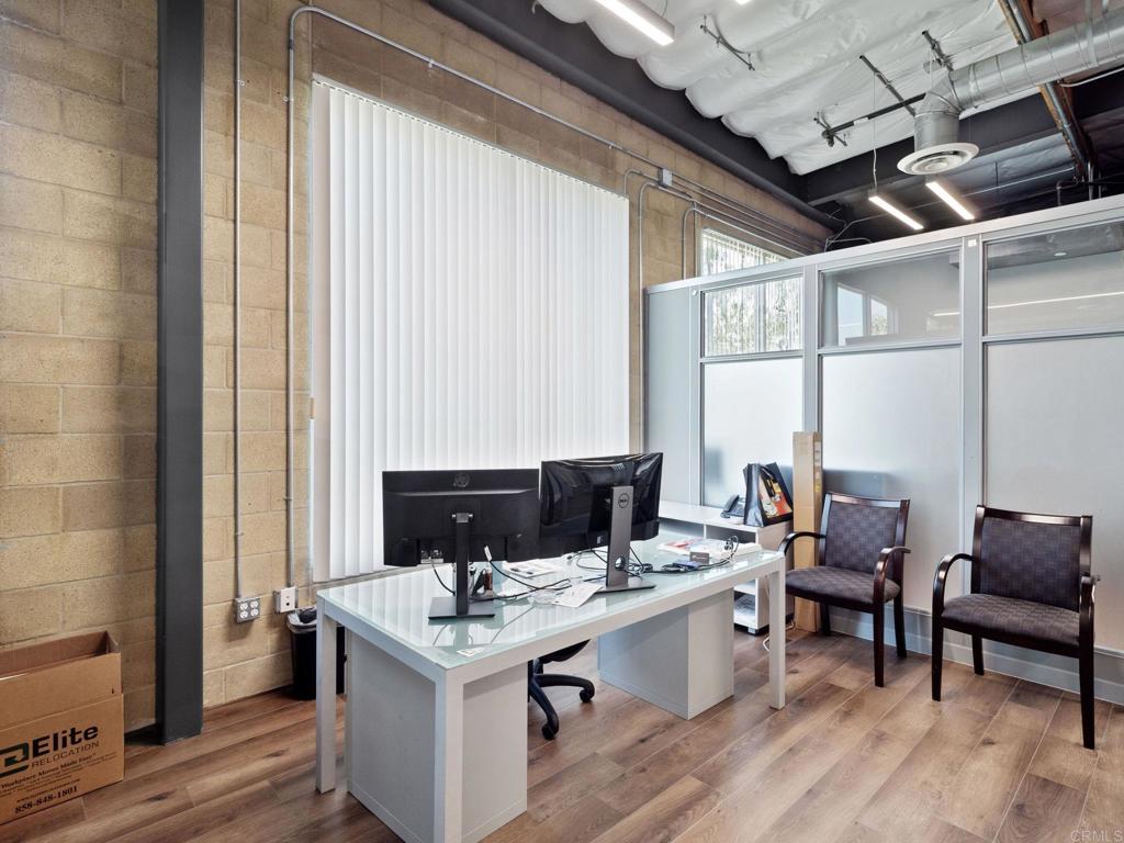 8945 Research Drive Irvine, CA 92618 - Photo 25 of 59 a kitchen with a stove and a table